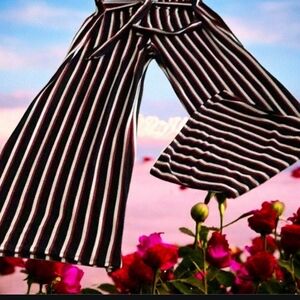 Try This pants, soft, stretchy, red, white, and black tie in the front. …